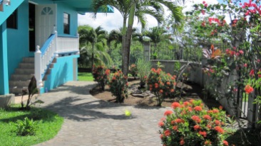 Private manicured gardens and grounds with amazing views of the southern Caribbean Sea and neighboring Grenadine Islands.